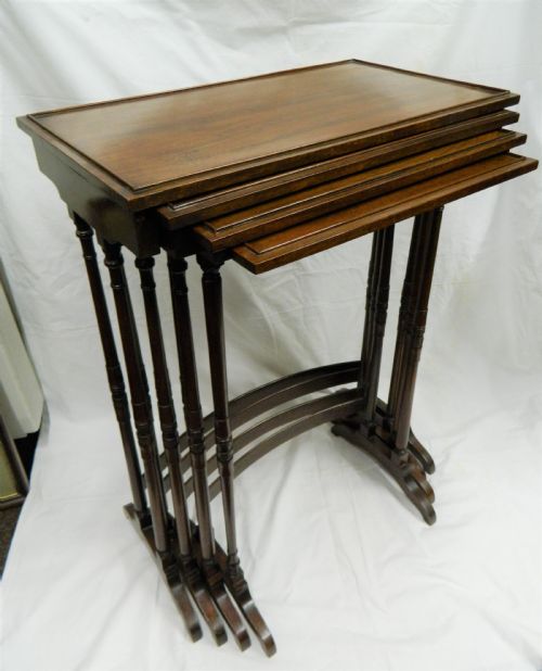 Nest of Four Mahogany Tables
