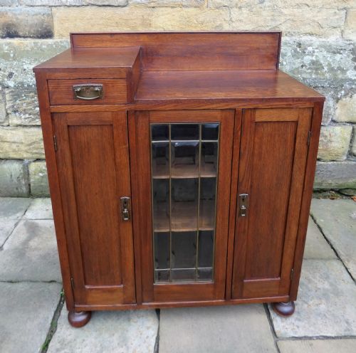 fig 1. Arts & Crafts oak cupboard