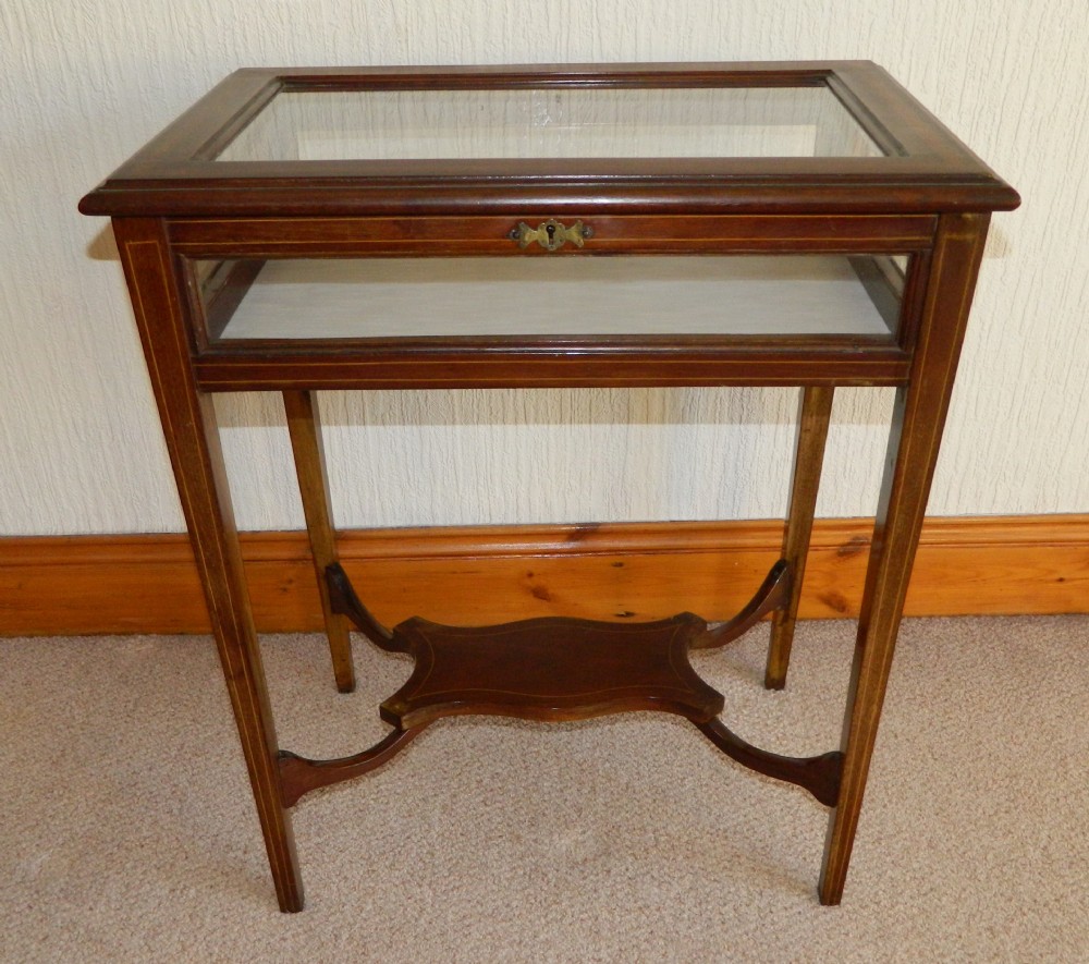 inlaid mahogany bijouterie table