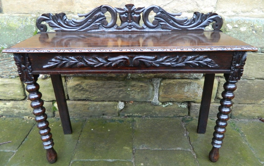 carved oak green man hall table