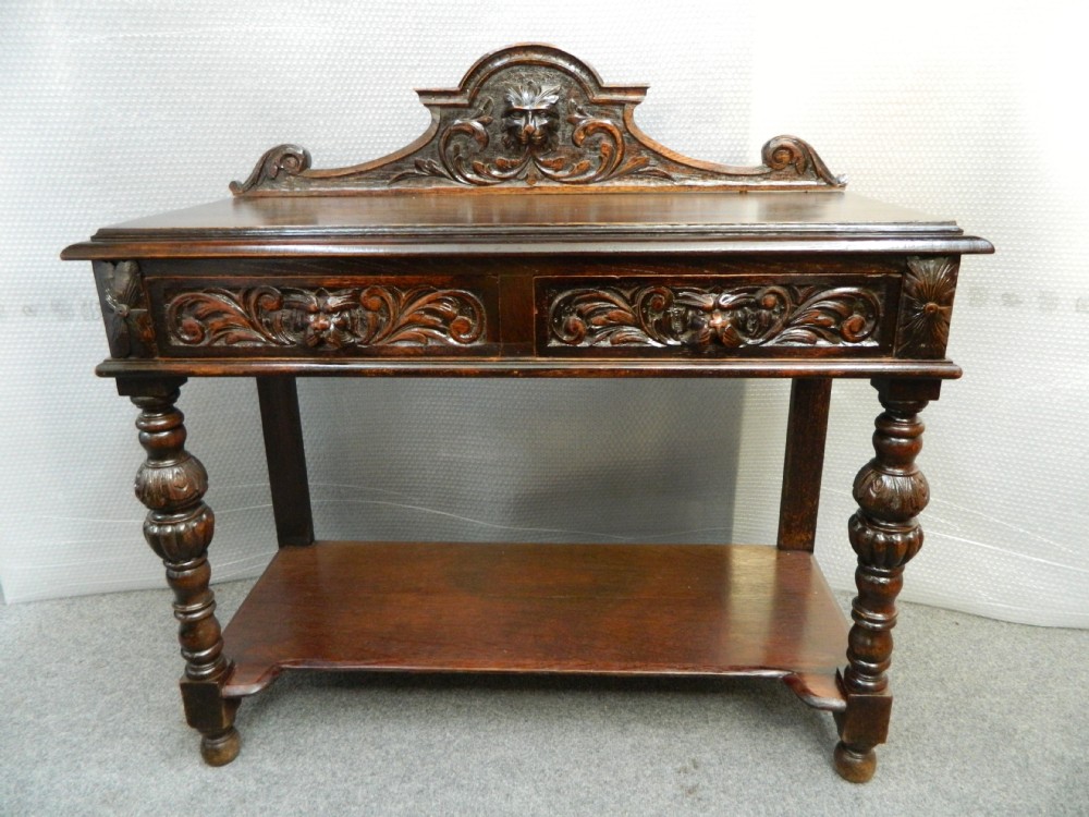 carved oak green man hall table