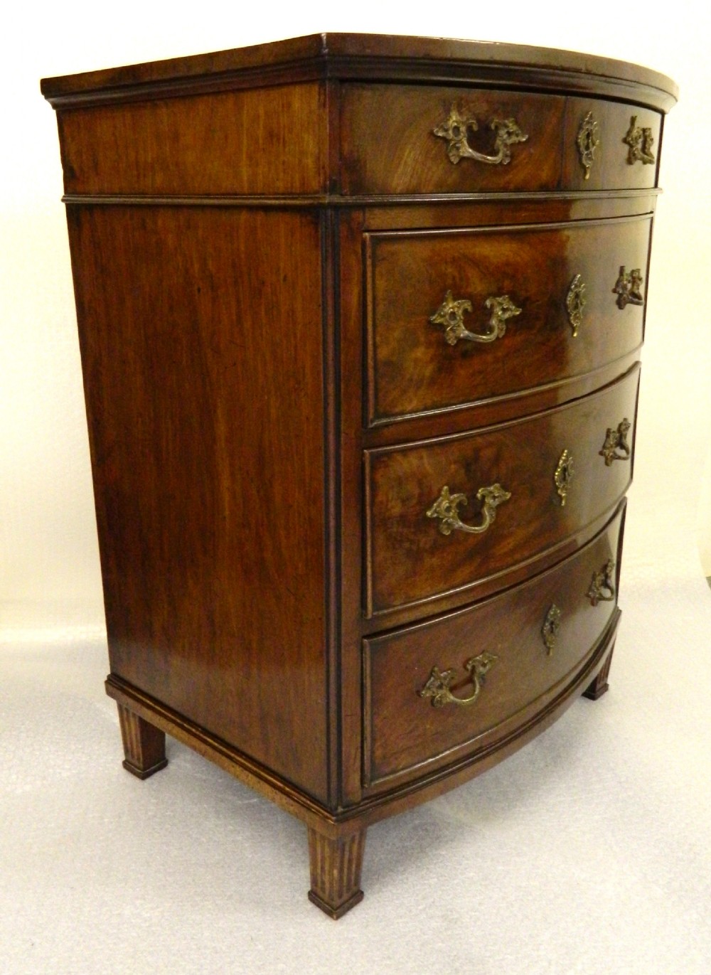 small mahogany bowfront chest of drawers