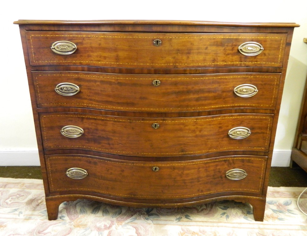 mahogany serpentine chest of drawers