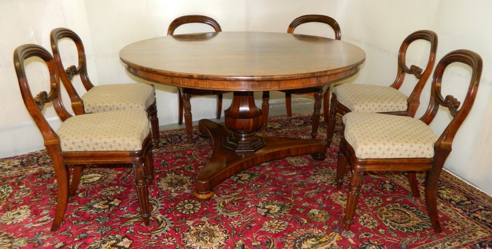 rosewood dining table & chairs