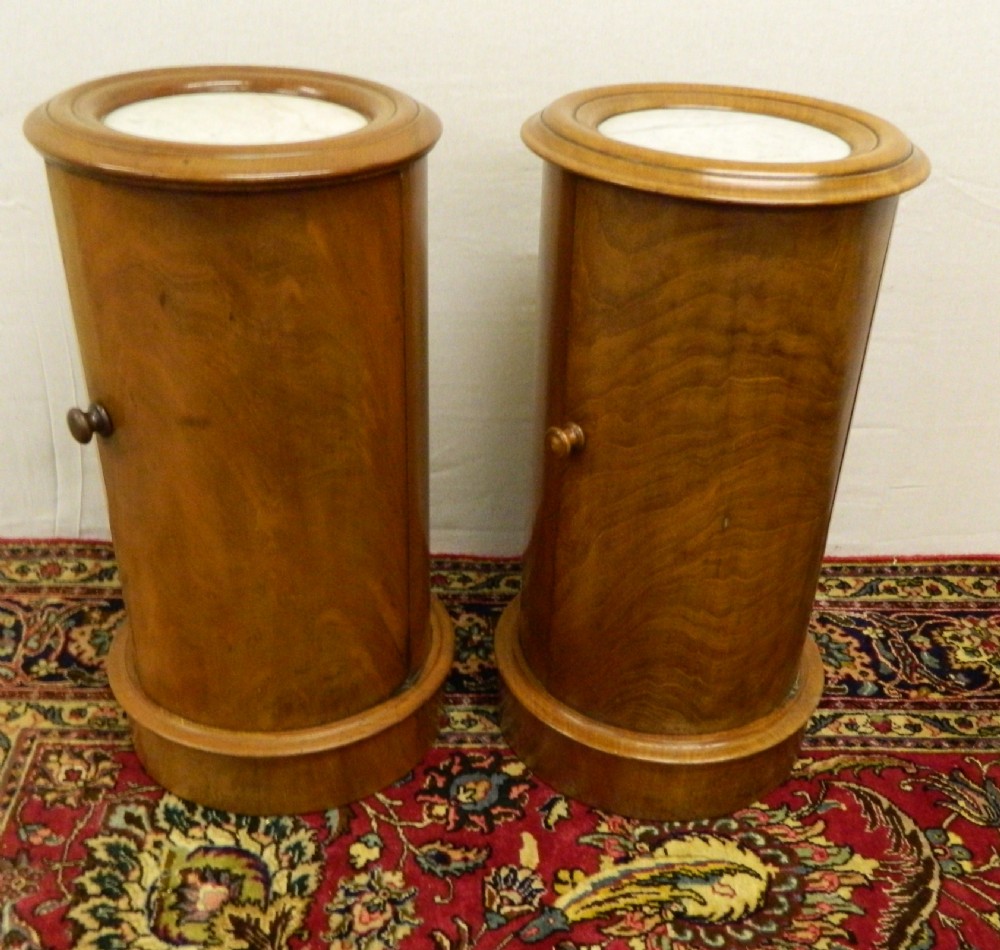 pair of mahogany cylinder bedside cabinets