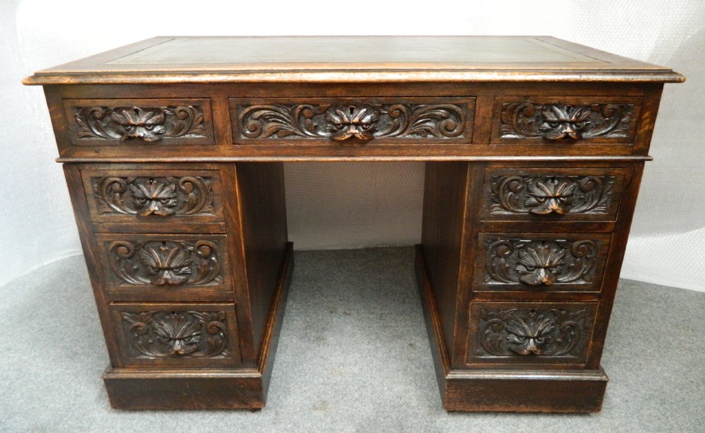 green man carved oak pedestal desk