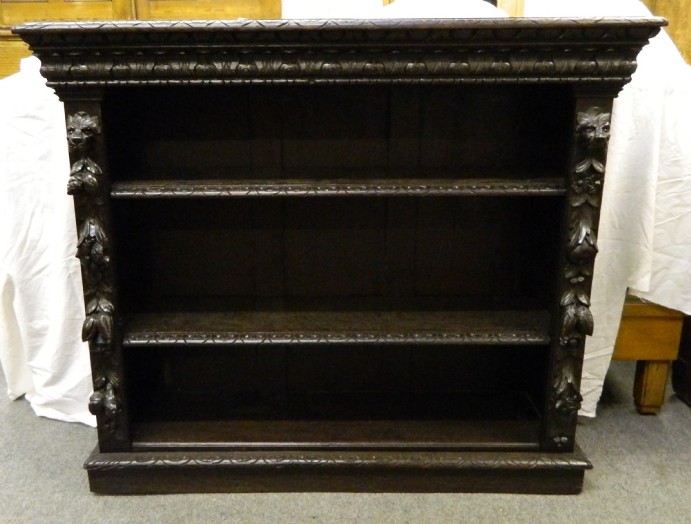 carved oak green man bookcase