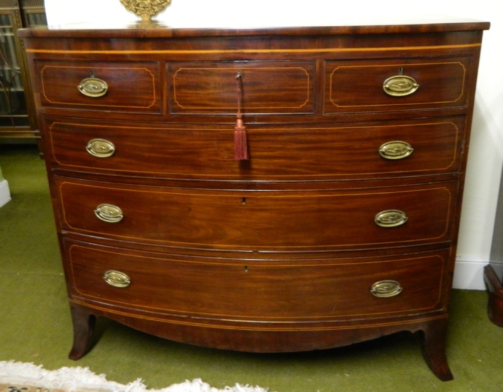 Georgian inlaid mahogany bow front chest of drawers