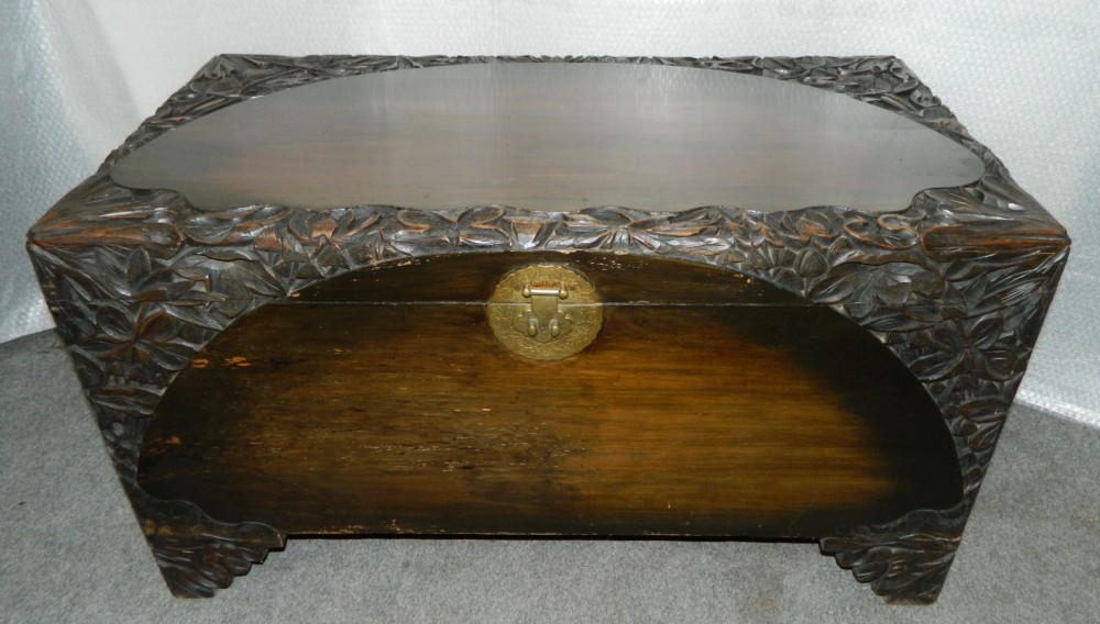carved camphor wood trunk