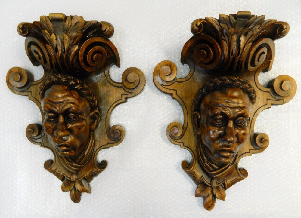 pair of carved wall brackets