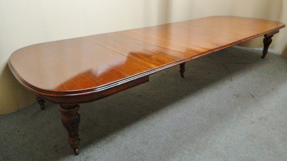 15' extending oak dining table with 5 leaves