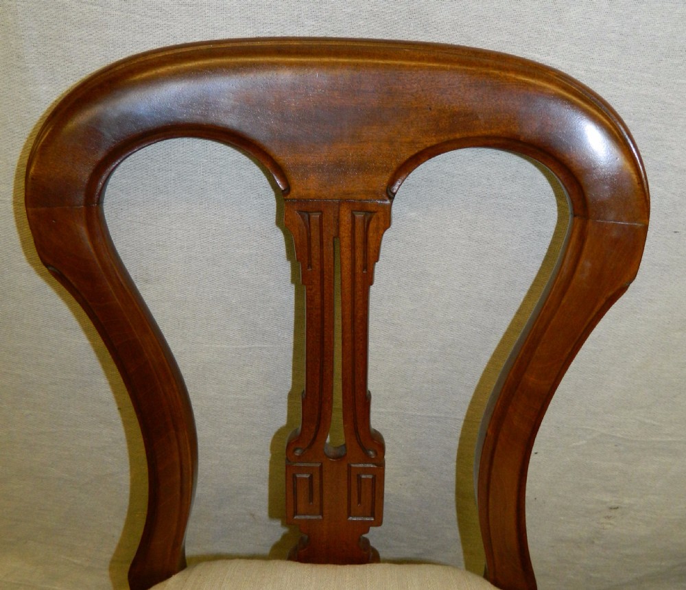 superb set of 12 mahogany dining chairs View III