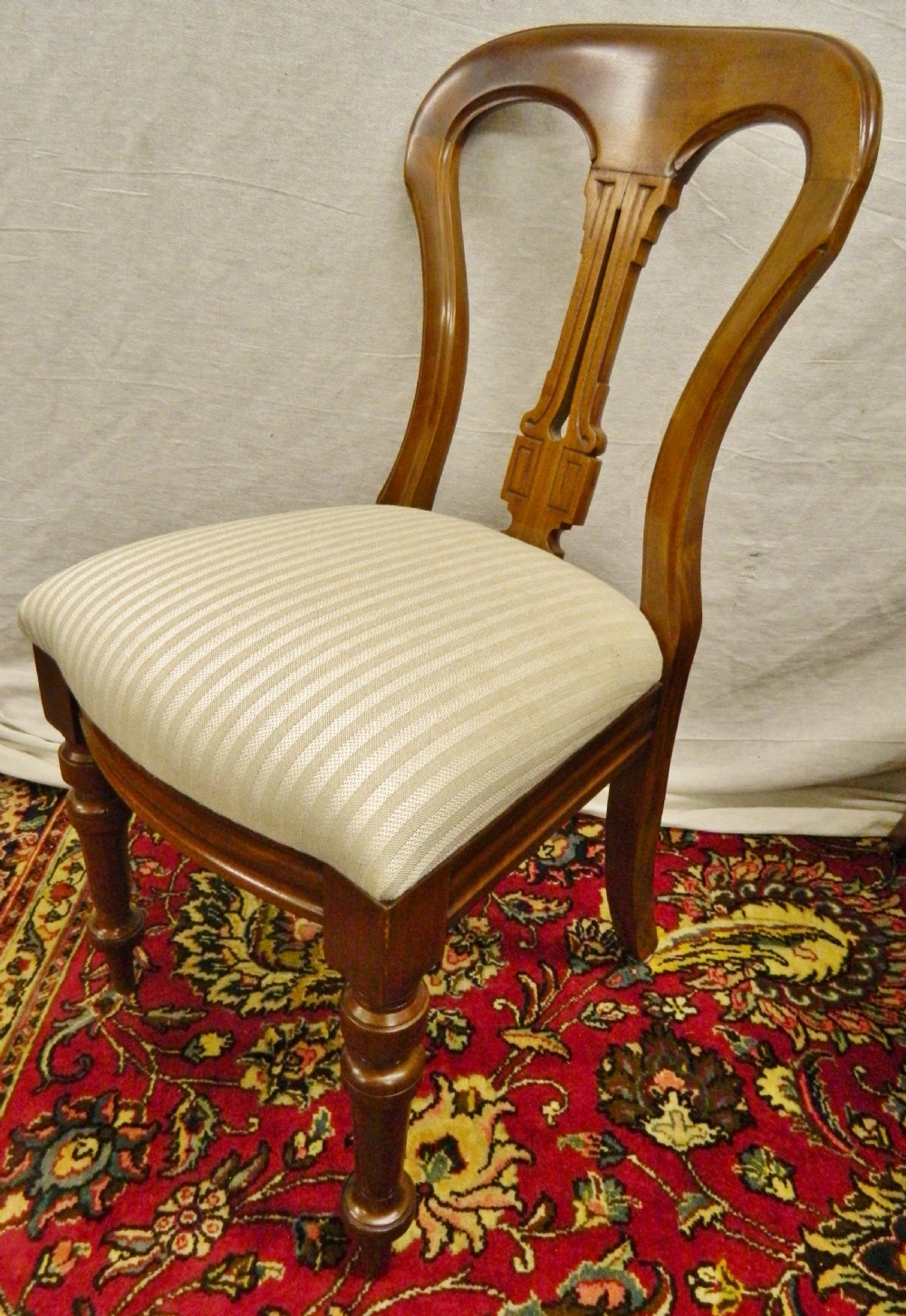 superb set of 12 mahogany dining chairs View IV
