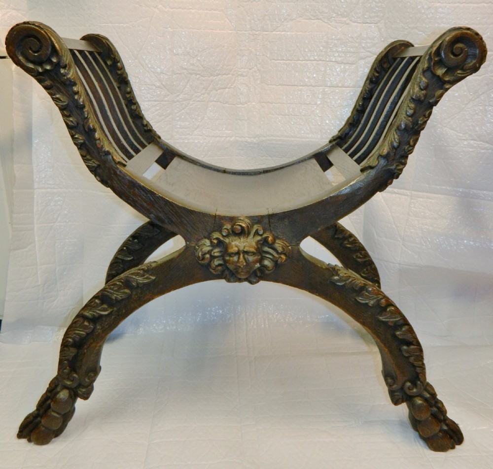 carved oak X frame stool