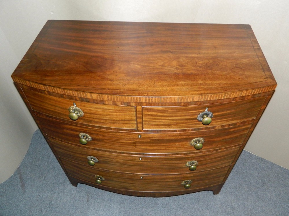 Regency mahogany bowfront chest of drawers View IV