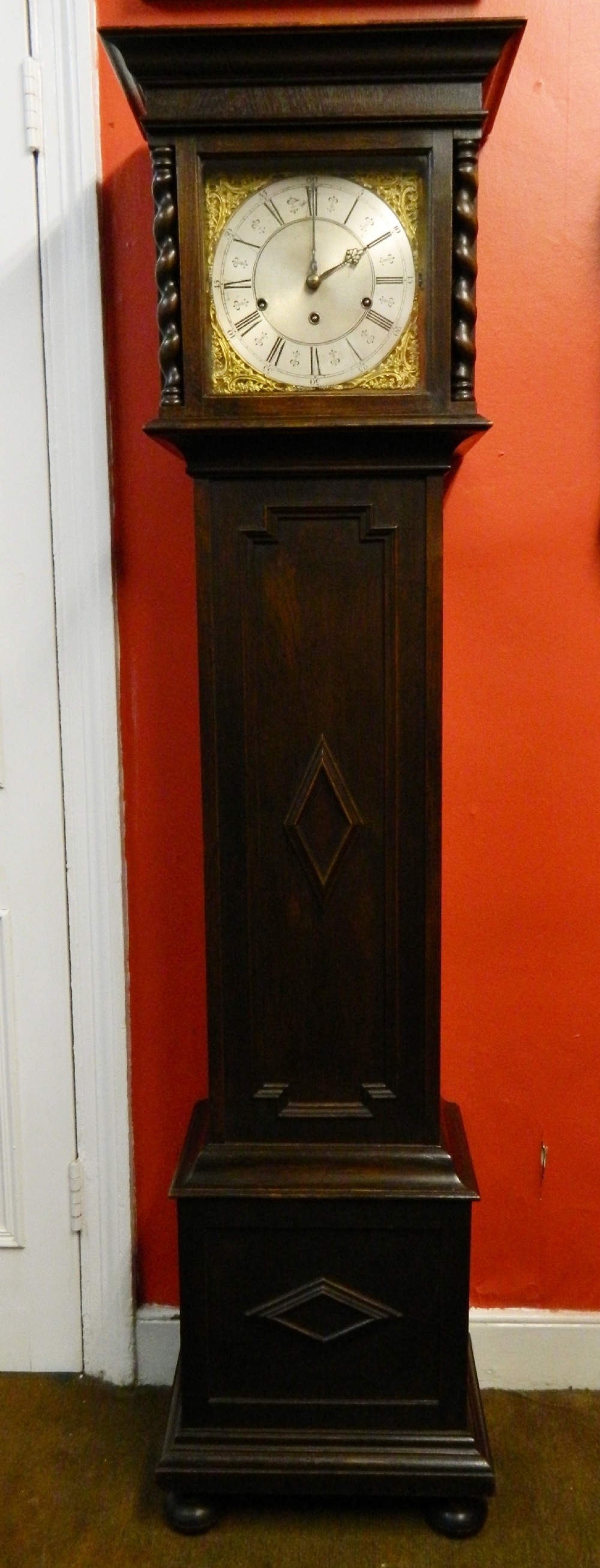 Oak grandmother clock by Winterhalder