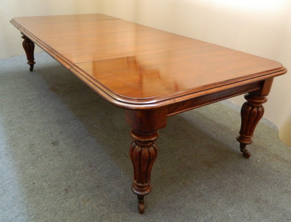 large extending mahogany dining table