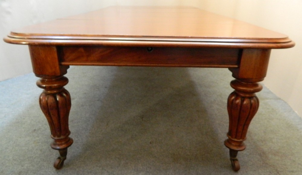 large extending mahogany dining table View III