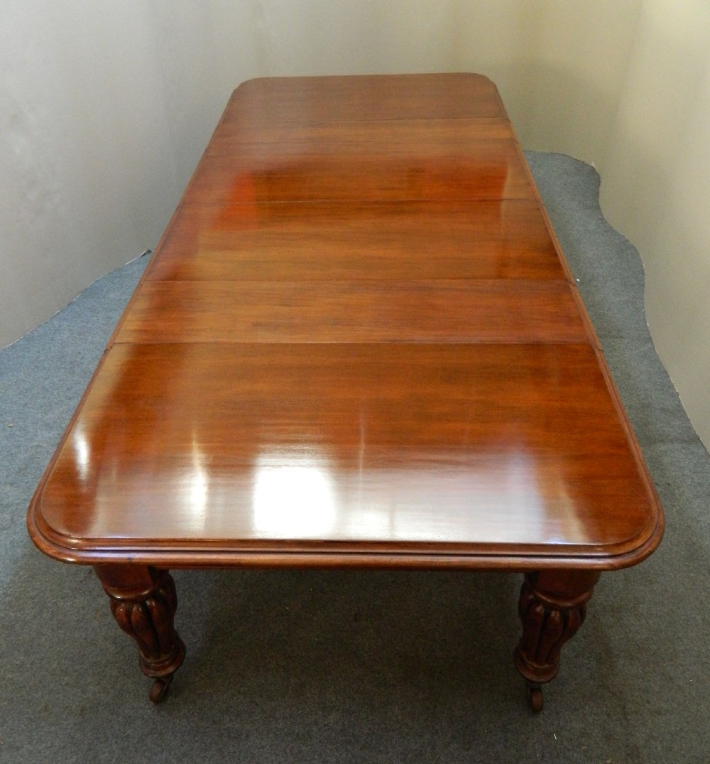 large extending mahogany dining table View IV