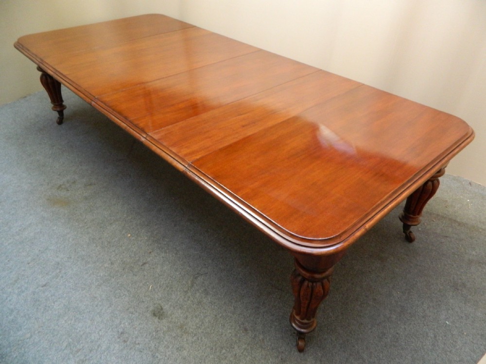 large extending mahogany dining table View VI