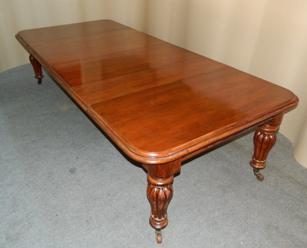 large extending mahogany dining table View VII