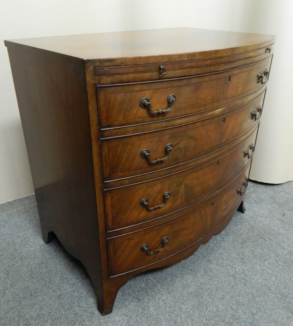 small mahogany bowfront chest of drawers with brushing slide View III