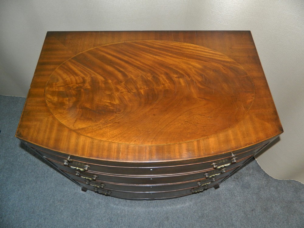 small mahogany bowfront chest of drawers with brushing slide View IV