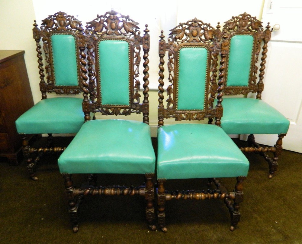 set of 4 carved oak chairs