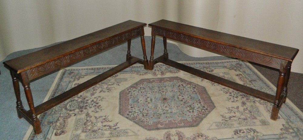 pair of carved oak benches