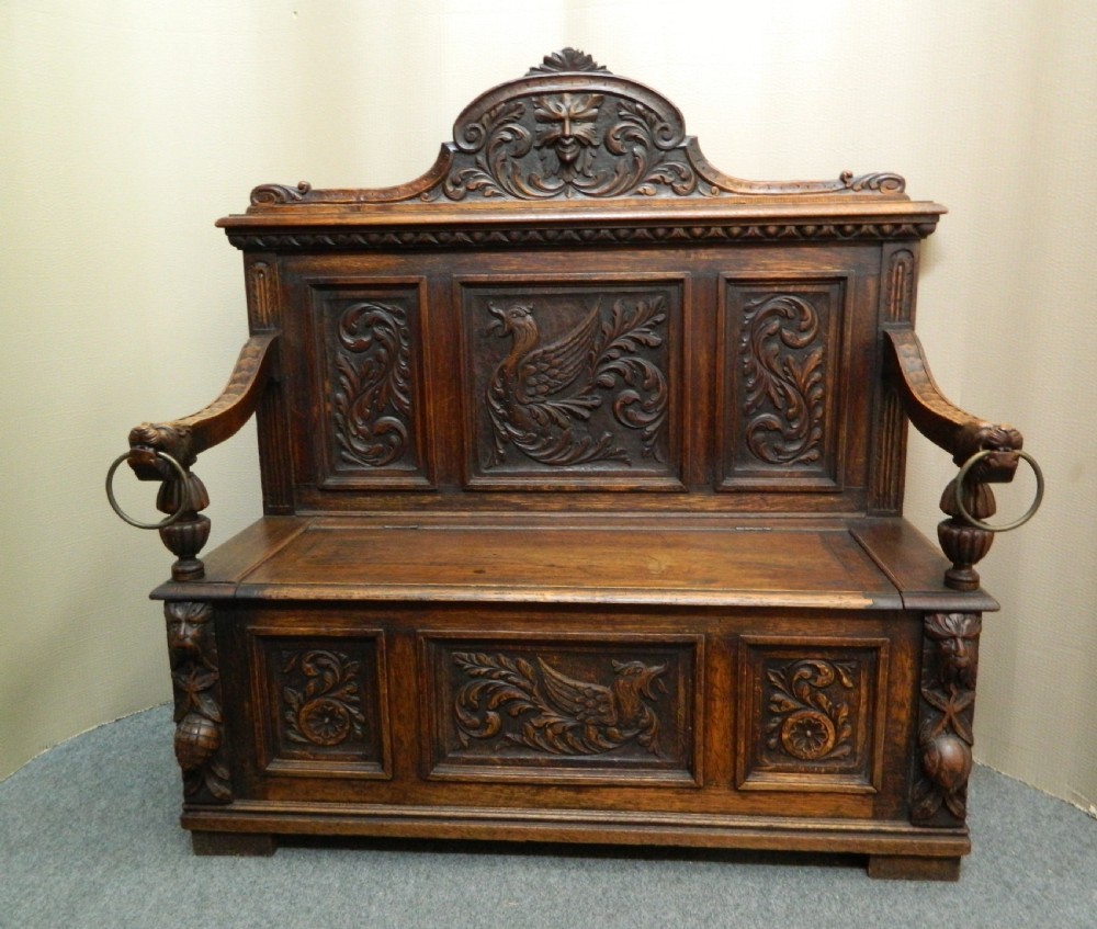 carved oak Greenman settle 