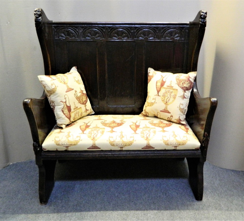 carved oak settle