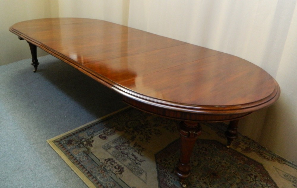 large 11' mahogany extending dining table