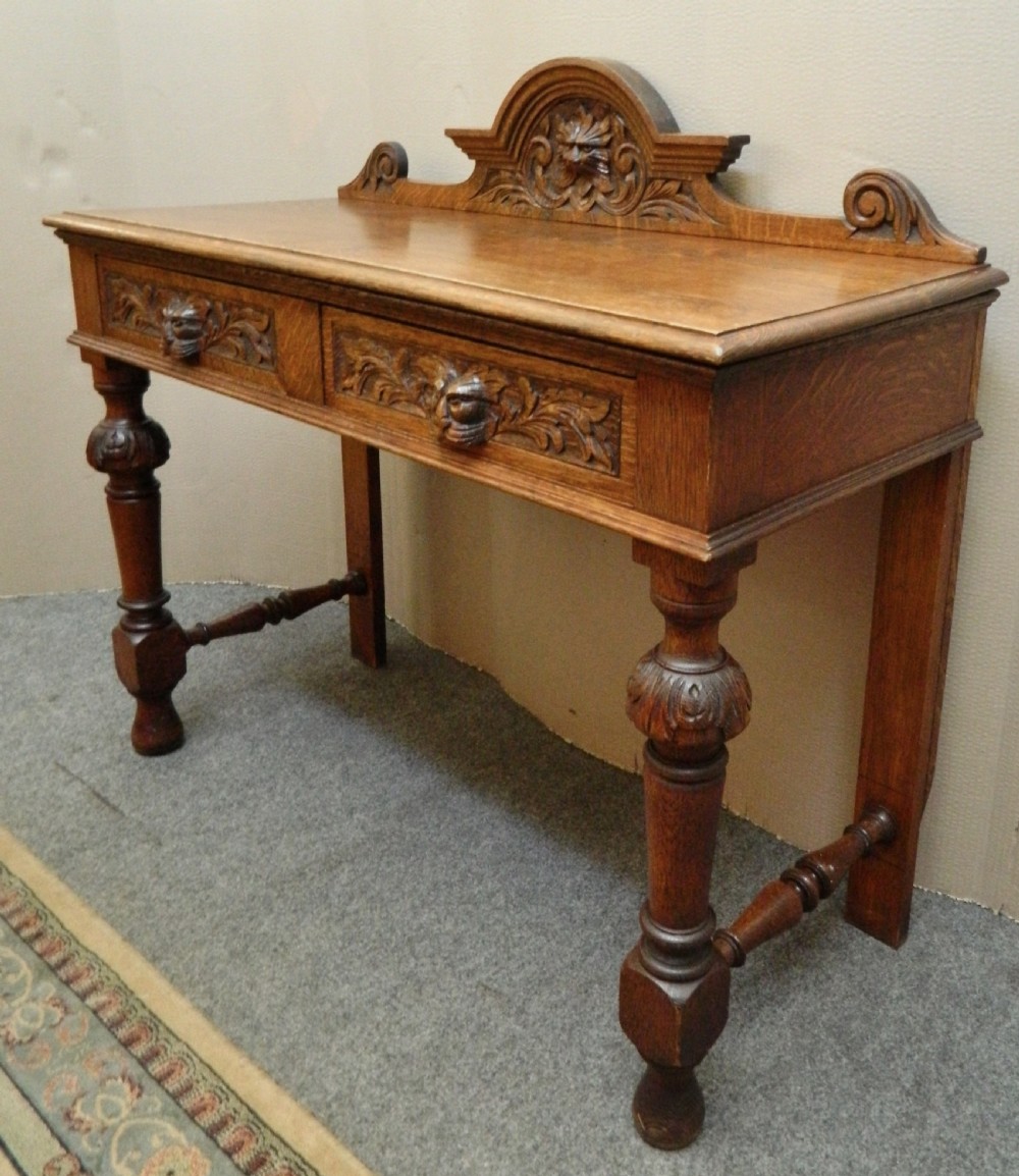carved oak green man table View II