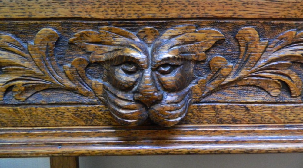 carved oak green man table View IV