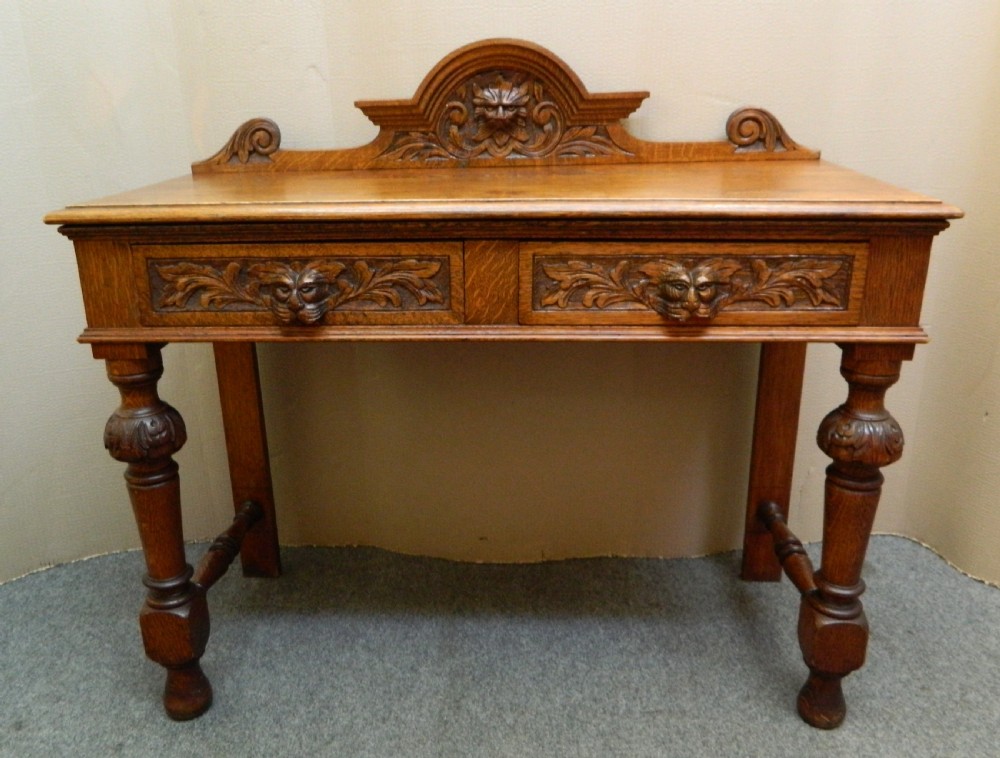 carved oak green man table View VI