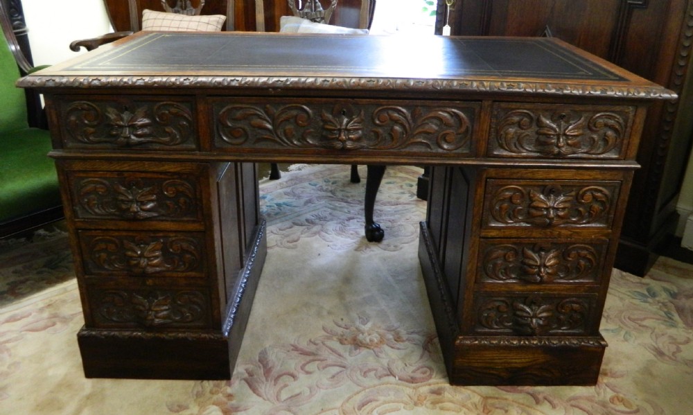 Carved oak green man desk View II