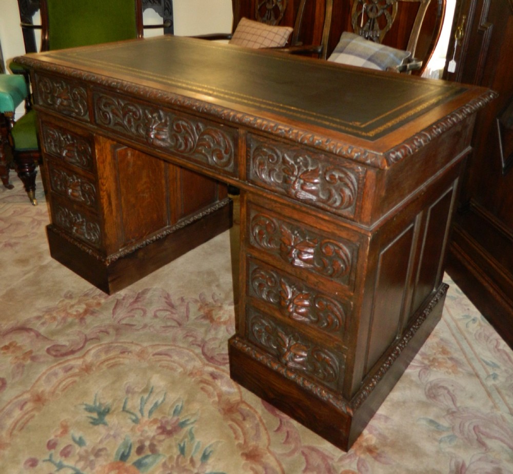Carved oak green man desk View III