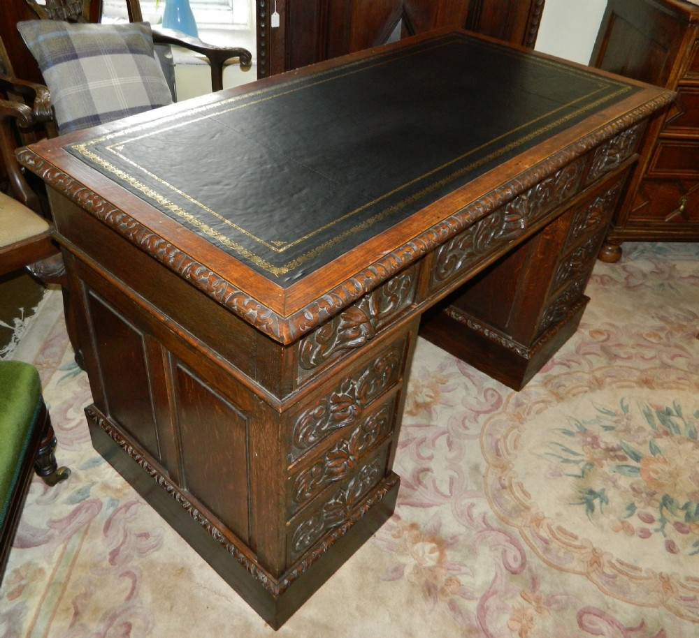 Carved oak green man desk View IV