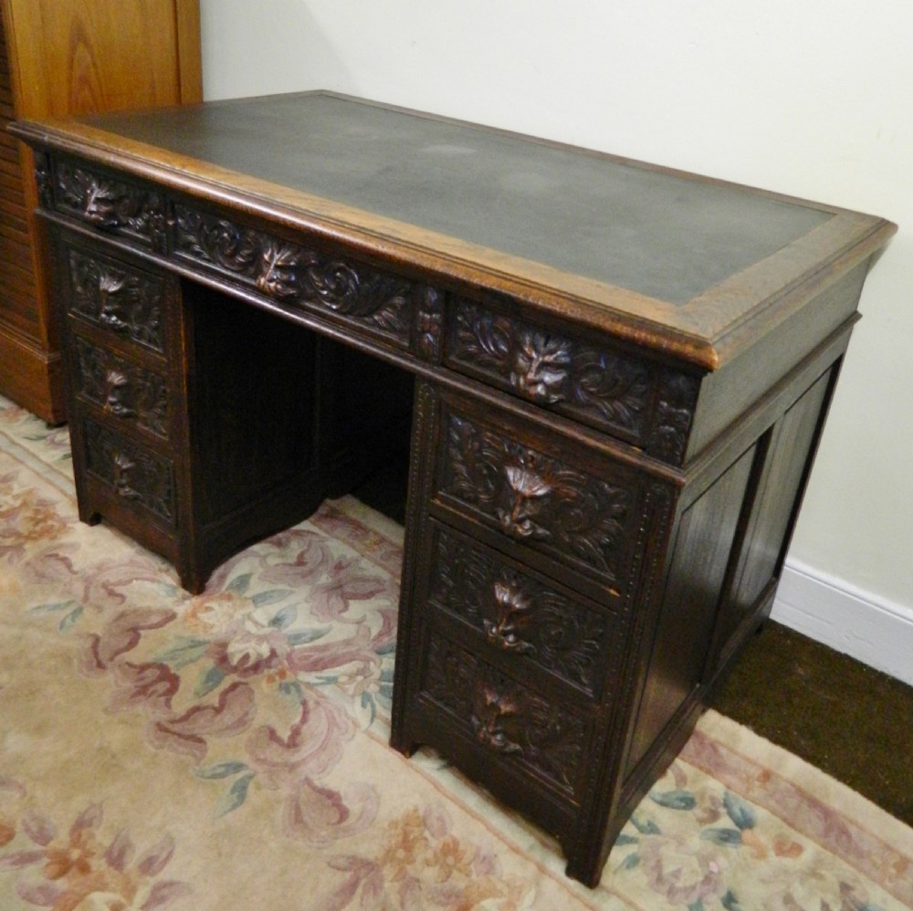 Carved oak green man desk View III