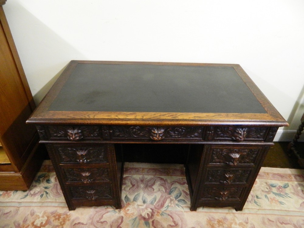 Carved oak green man desk View VI