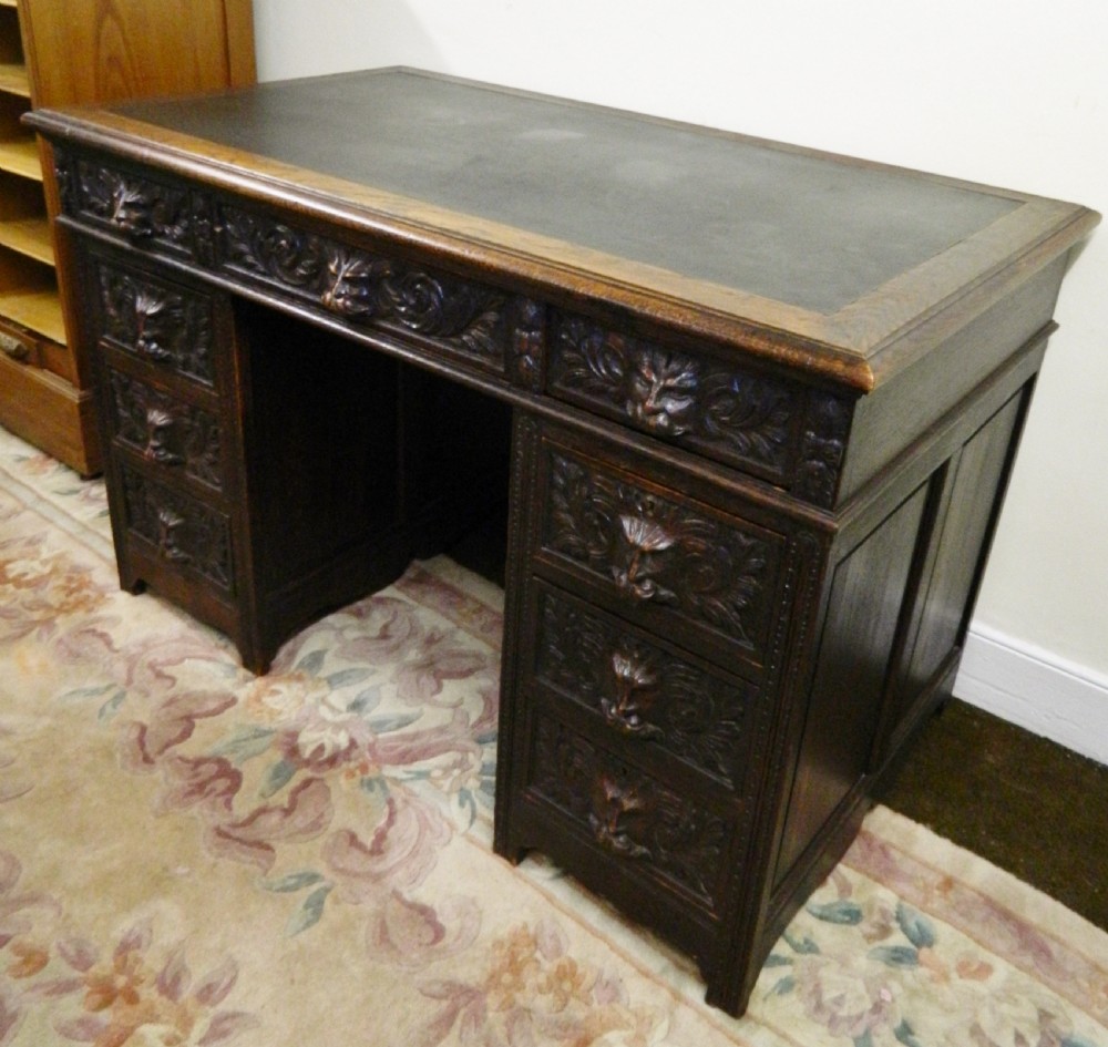 Carved oak green man desk View VII