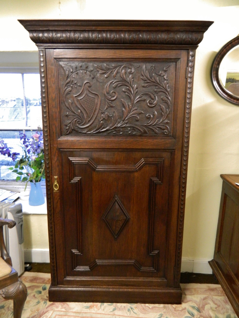 carved oak cupboard 