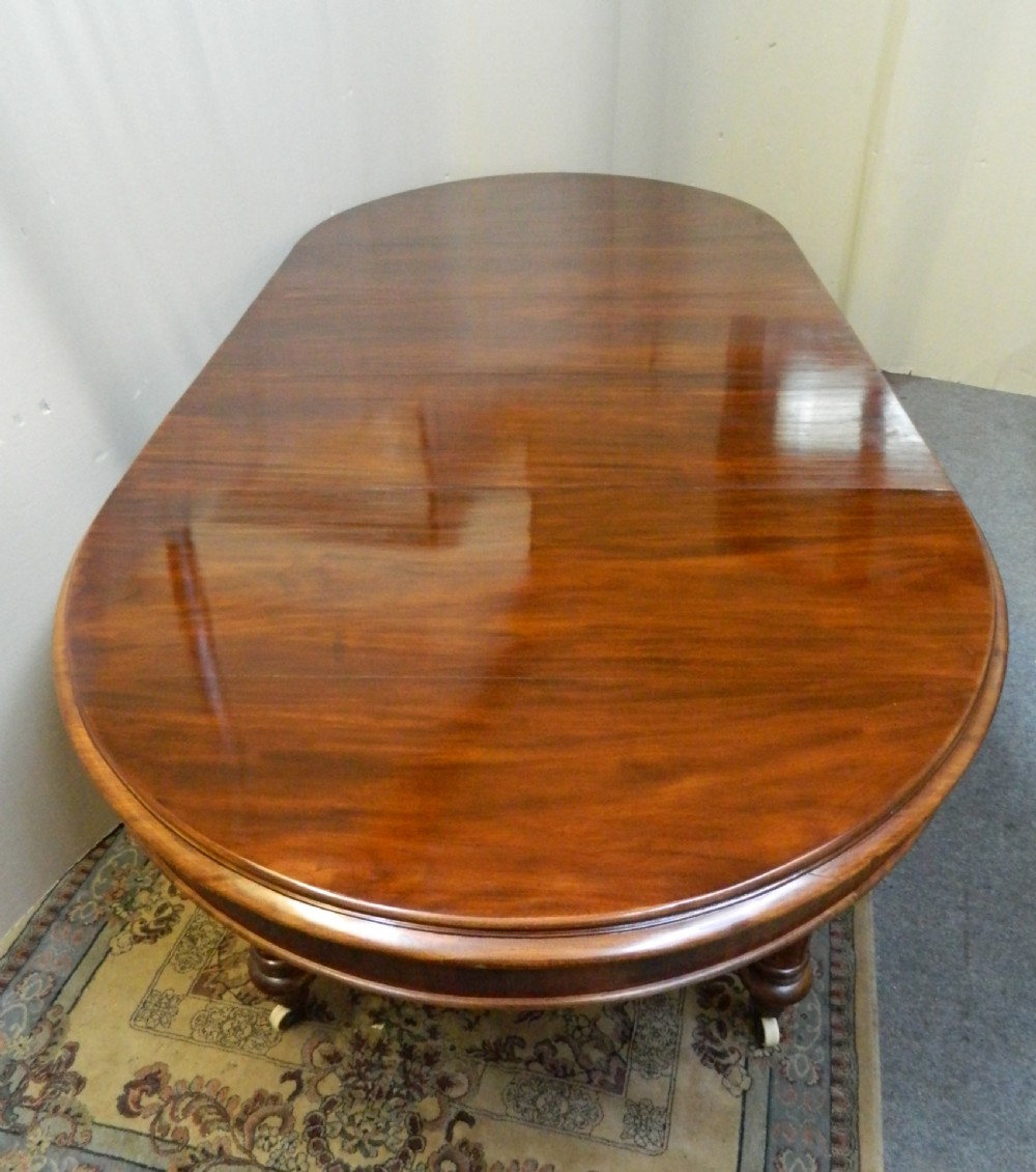 large mahogany extending dining table View IV