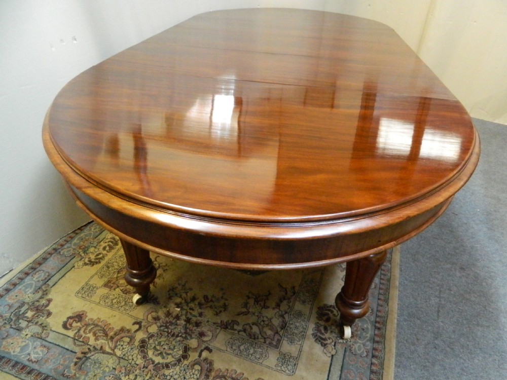large mahogany extending dining table View V
