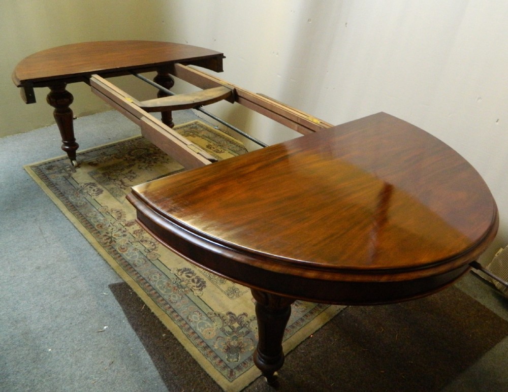 large mahogany extending dining table View VII