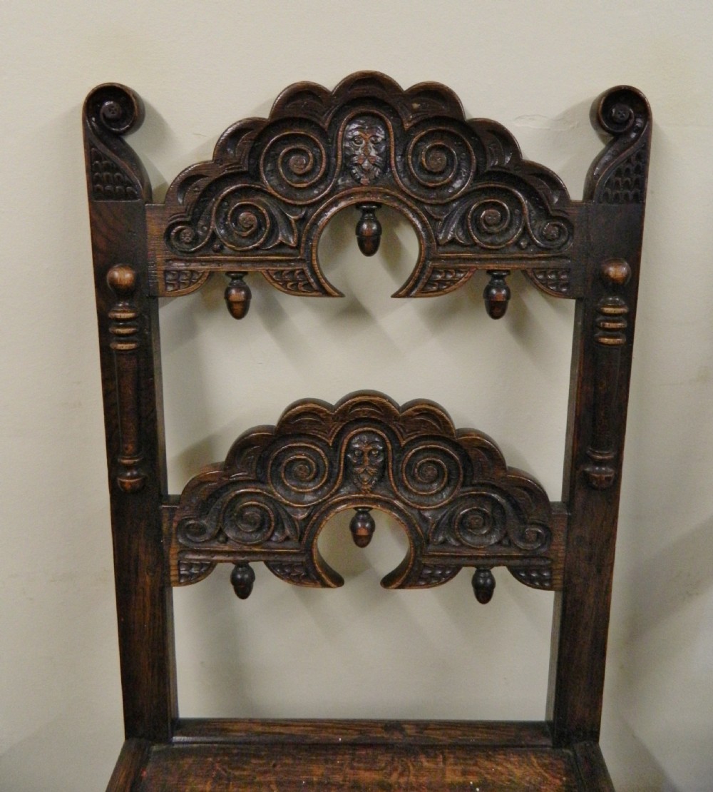 set of 8 carved oak chairs View II