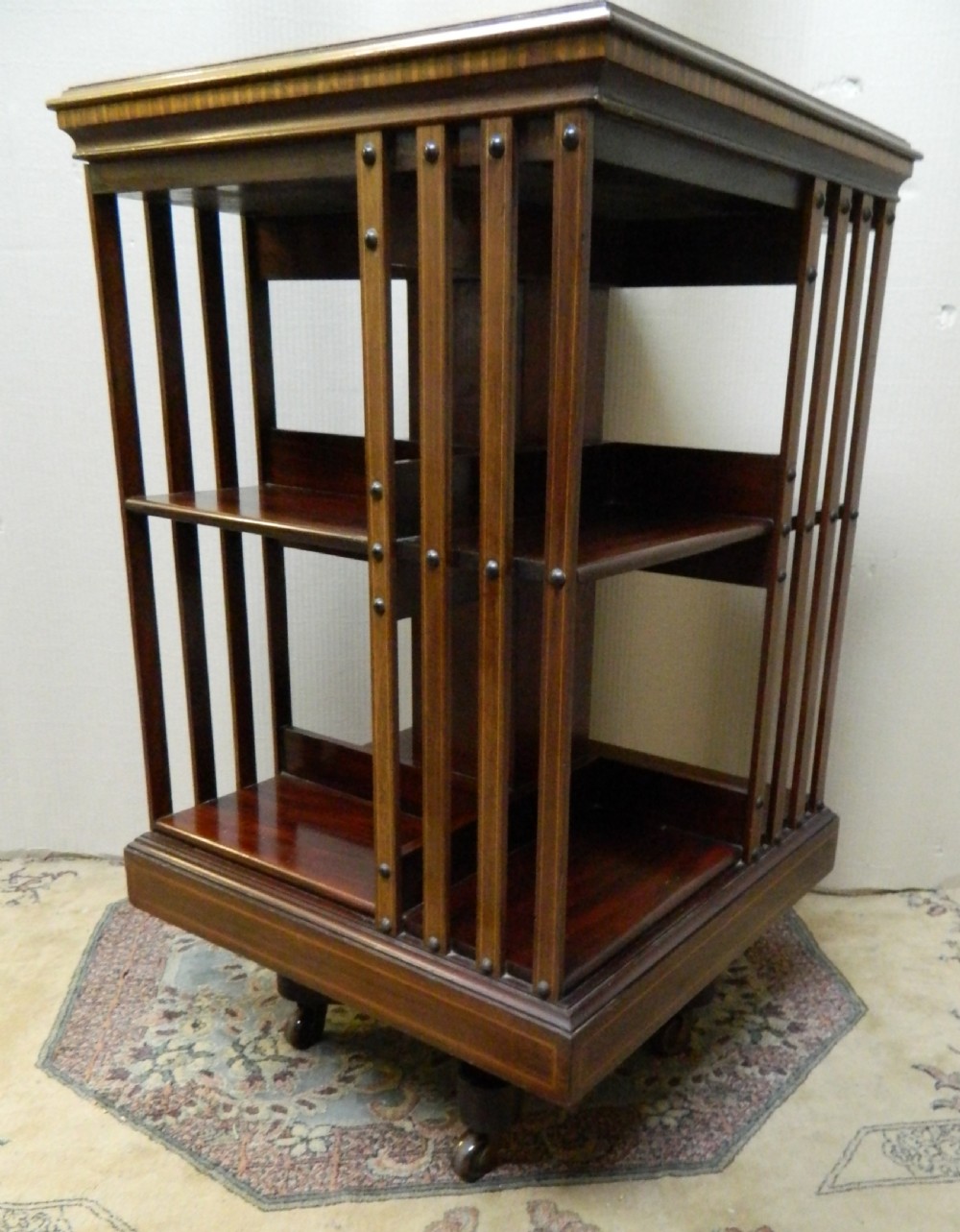 inlaid revolving bookcase View V