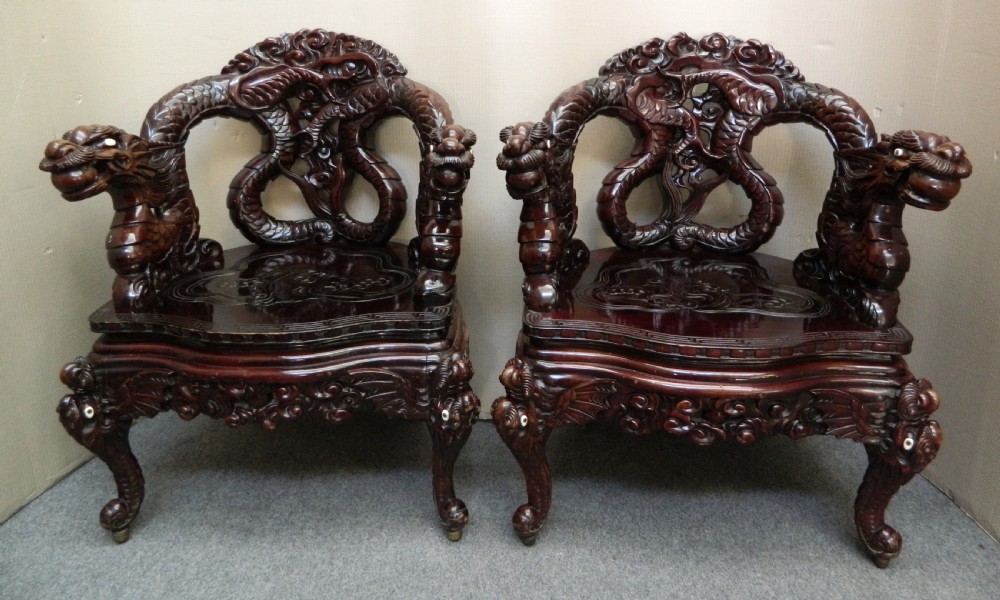 impressive pair of Chinese Dragon chairs