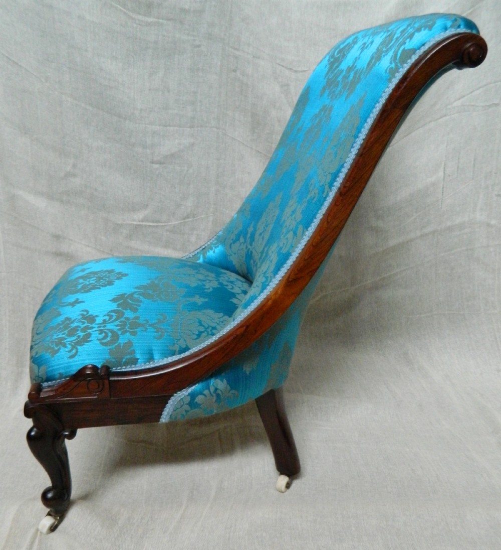 pair of rosewood slipper chairs View V