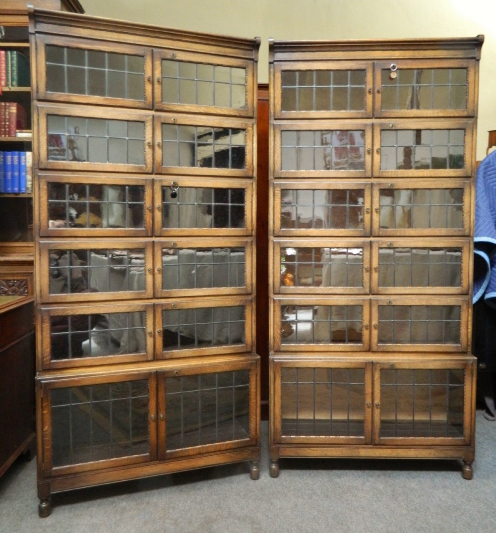 pair of oak stacking bookcases ( with locks ) 
